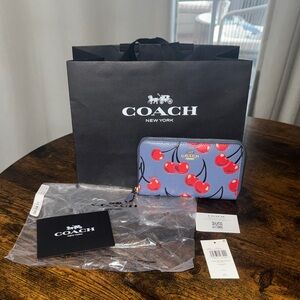 Coach Blue and Red Cherry Pattern Wallet comes with all shown Original tags